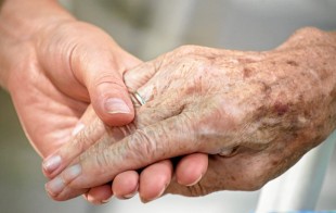 holding hands - palliative care